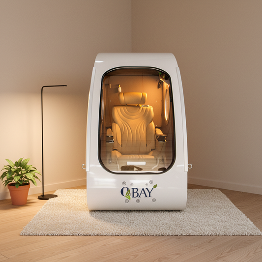 O2BAY seated hard shell hyperbaric chamber positioned in an indoor room